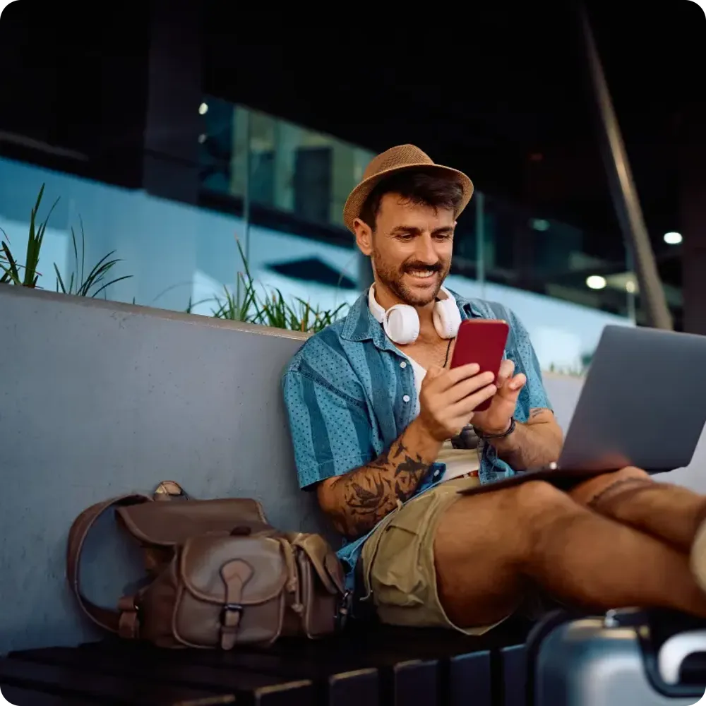 Traveler completing the quick online visa application on a smartphone with etourist.online